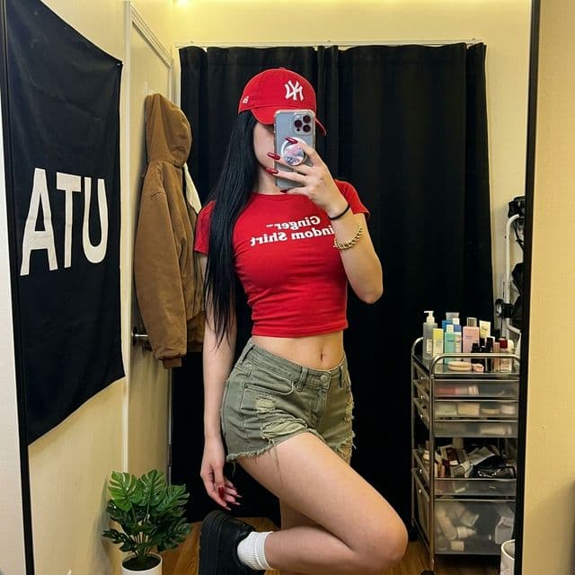 AI Prompt: Red Streetwear Mirror Selfie – Cap & Phone Face-Hide Technique